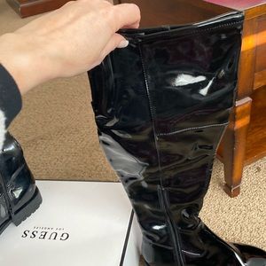 Very sexy to the knee black patent pleather boots!